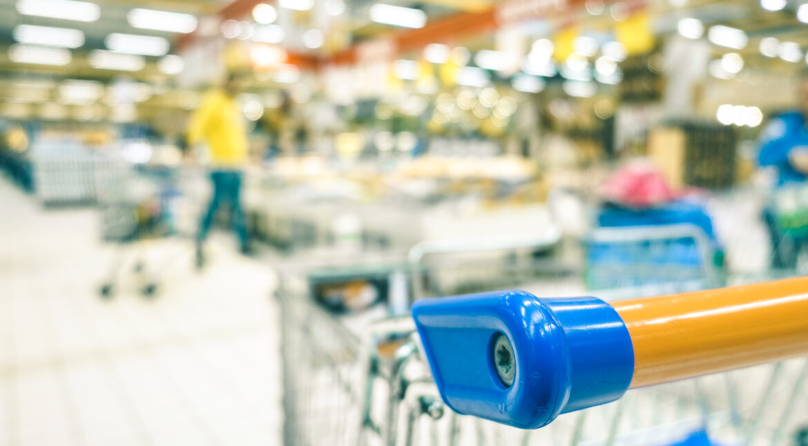 Blurred defocused bokeh of grocery supermarket - Consumerism con